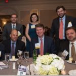 Group of people at a table at the CREBA Awards