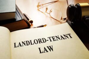 Landlord-tenant law on an office table. stock photo